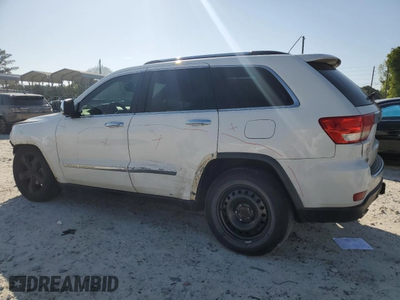 2013 Jeep Grand Cherokee Overland with VIN 1C4RJECT7DC588233, listed as a Copart auction lot 52672605 with 231,329 mi miles and Salvage Title. Bid and sale history available at carsss.com. Image 2.