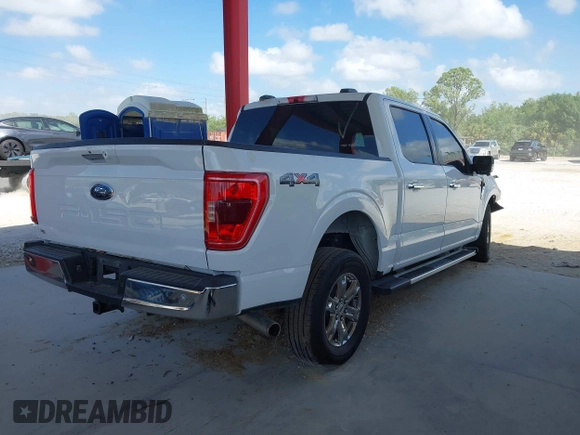 2022 Ford F-150 XL with VIN 1FTFW1E55NFB73942, listed as a IAAI auction lot 41940846 with 50,831 mi miles and . Bid and sale history available at DreamBid. Image 4.