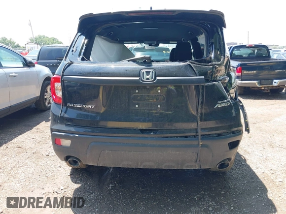 2021 Honda Passport Sport with VIN 5FNYF8H24MB043219, listed as a IAAI auction lot 42461003 with 38,800 mi miles and . Bid and sale history available at DreamBid. Image 16.