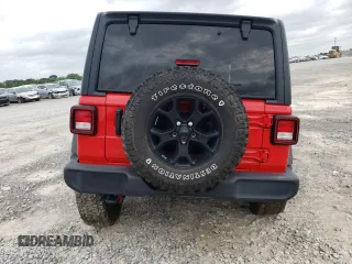 2021 Jeep Wrangler Unlimited Willys with VIN 1C4HJXDG8MW650763, listed as a Copart auction lot 59515805 with 52,749 mi miles and Salvage title. Bid and sale history available at DreamBid. Image 6.