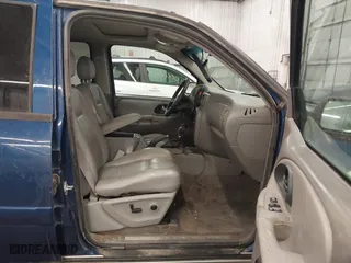 2005 Chevrolet TrailBlazer LT with VIN 1GNDT13S052136871, listed as a IAAI auction lot 41644035 with 174,070 mi miles. Bid and sale history available at carsss.com. Image 5.