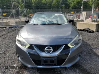 2016 Nissan Maxima SL with VIN 1N4AA6APXGC903559, listed as a Copart auction lot 61213525 with 124,575 mi miles and Salvage title. Bid and sale history available at DreamBid. Image 5.