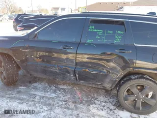 2015 Jeep Grand Cherokee Altitude with VIN 1C4RJFAG6FC724592, listed as a IAAI auction lot 41525448 with 173,306 mi miles. Bid and sale history available at carsss.com. Image 17.