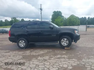 2014 Chevrolet Tahoe LT z VIN 1GNSKBE02ER133795, wystawiony jako IAAI lot #42335322 z przebiegiem 217 292 mil mil oraz . Historia ofert i sprzedaży dostępna na DreamBid. Obrazek 13.
