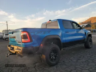 2021 Ram 1500 TRX with VIN 1C6SRFU98MN757772, listed as a Copart auction lot 49923465 with 27,250 mi miles and Salvage Title. Bid and sale history available at carsss.com. Image 3.