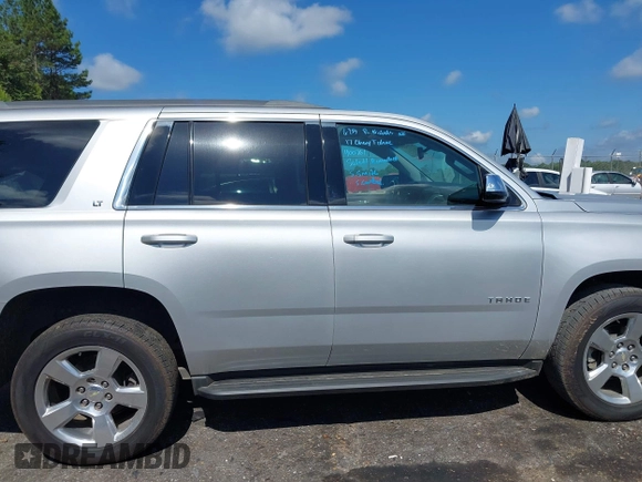 2017 Chevrolet Tahoe LT with VIN 1GNSCBKC6HR400761, listed as a IAAI auction lot 42612368 with 125,843 mi miles and . Bid and sale history available at DreamBid. Image 12.