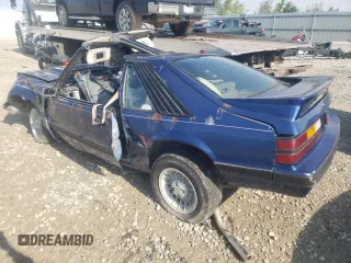 1985 Ford Mustang with VIN 1FABP28A4FF128833, listed as a Copart auction lot 61380294 with Not provided miles and Non repairable. Bid and sale history available at DreamBid. Image 2.