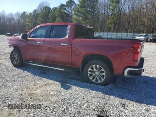 2019 Chevrolet Silverado 1500 LTZ with VIN 3GCUYGED4KG261726, listed as a Copart auction lot 87998295 with 84,904 mi miles and Salvage Title. Bid and sale history available at DreamBid. Image 2.