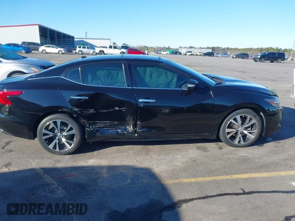 2016 Nissan Maxima SV with VIN 1N4AA6AP0GC385090, listed as a IAAI auction lot 41215857 with 97,072 mi miles and . Bid and sale history available at DreamBid. Image 13.