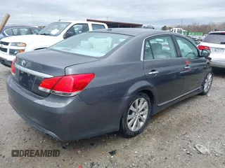 2012 Toyota Avalon with VIN 4T1BK3DB6CU459249, listed as a IAAI auction lot 41802571 with 147,955 mi miles. Bid and sale history available at carsss.com. Image 4.