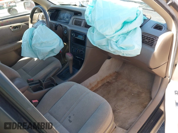2001 Toyota Camry CE with VIN 4T1BG22K71U027796, listed as a IAAI auction lot 41749025 with 167,917 mi miles and . Bid and sale history available at DreamBid. Image 5.