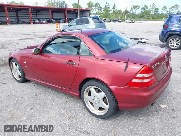 2000 Mercedes-Benz SLK 230 Kompressor with VIN WDBKK47F2YF146797, listed as a IAAI auction lot 42823113 with 35,881 mi miles and . Bid and sale history available at DreamBid. Image 3.