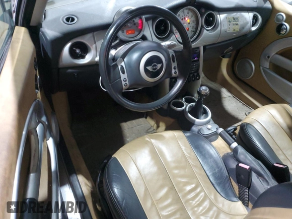 2002 MINI Hardtop with VIN WMWRC33402TC36986, listed as a Copart auction lot 50131045 with 194,224 mi miles and Salvage Title. Bid and sale history available at DreamBid. Image 8.