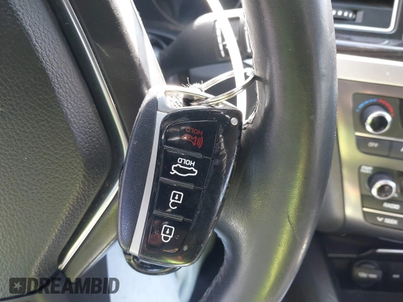 2015 Hyundai Genesis 3.8L with VIN KMHGN4JE5FU095721, listed as a IAAI auction lot 42055501 with 89,517 mi miles. Bid and sale history available at carsss.com. Image 11.