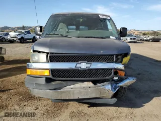 2004 Chevrolet Express Passenger with VIN 1GAHG39U641193334, listed as a Copart auction lot 74011934 with 330,603 mi miles and Salvage Title. Bid and sale history available at carsss.com. Image 5.
