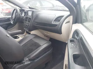 2018 Dodge Grand Caravan SXT with VIN 2C4RDGCGXJR283091, listed as a IAAI auction lot 41966553 with 102,309 mi miles and . Bid and sale history available at DreamBid. Image 5.