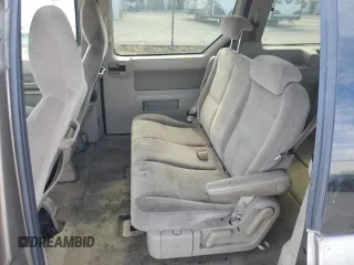 2005 Ford Freestar SE z VIN 2FMDA51635BA60614, wystawiony jako Copart lot #60058044 z przebiegiem 228 858 mil mil oraz Szkody całkowita. Historia ofert i sprzedaży dostępna na DreamBid. Obrazek 11.
