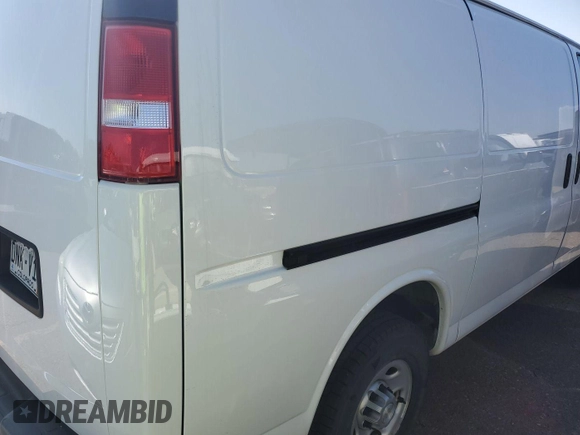 2021 Chevrolet Express Cargo with VIN 1GCWGAFP2M1303233, listed as a IAAI auction lot 42731173 with 57,034 mi miles and . Bid and sale history available at DreamBid. Image 2.