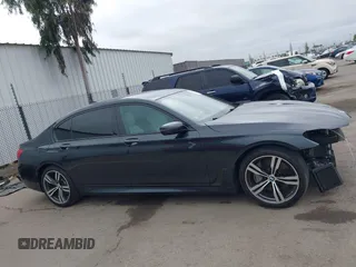 2019 BMW 7 Series 750i with VIN WBA7F0C50KGM26010, listed as a IAAI auction lot 42188421 with 71,576 mi miles and . Bid and sale history available at DreamBid. Image 14.