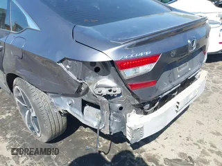 2020 Honda Accord Sport z VIN 1HGCV2F32LA020830, wystawiony jako IAAI lot #42048772 z przebiegiem 84 294 mil mil oraz . Historia ofert i sprzedaży dostępna na DreamBid. Obrazek 18.