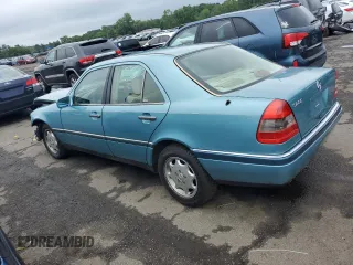 1994 Mercedes-Benz C 230/260/280/320 with VIN WDBHA28E8RF098148, listed as a Copart auction lot 60884345 with 238,600 mi miles and Salvage title. Bid and sale history available at DreamBid. Image 2.