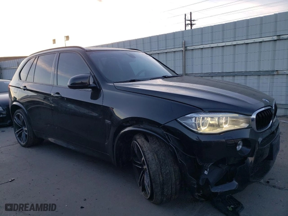 2015 BMW X5 M with VIN 5YMKT6C50F0C89135, listed as a Copart auction lot 84718754 with 105,963 mi miles and Salvage Title. Bid and sale history available at carsss.com. Image 4.