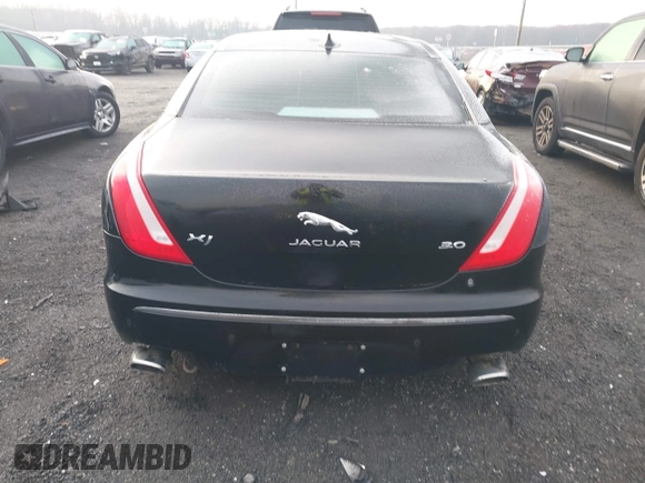 2014 Jaguar XJ with VIN SAJWA1CZXE8V74400, listed as a IAAI auction lot 38250698 with 102,205 mi miles and . Bid and sale history available at DreamBid. Image 17.