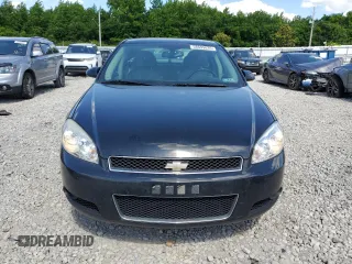 2014 Chevrolet Impala LTZ with VIN 2G1WC5E33E1164638, listed as a Copart auction lot 58699635 with 189,636 mi miles and Salvage title. Bid and sale history available at DreamBid. Image 5.