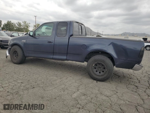 2000 Ford F-150 XL with VIN 1FTZX1721YKB14556, listed as a Copart auction lot 53227925 with 0 mi miles and Salvage Title. Bid and sale history available at carsss.com. Image 2.