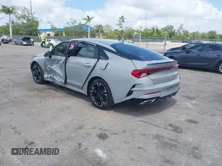 2023 Kia K5 GT-Line z VIN 5XXG64J25PG179696, wystawiony jako IAAI lot #42114587 z przebiegiem 49 192 mil mil oraz . Historia ofert i sprzedaży dostępna na DreamBid. Obrazek 3.