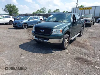 2005 Ford F-150 XLT with VIN 1FTPW14545FB49587, listed as a IAAI auction lot 42709724 with 165,193 mi miles and . Bid and sale history available at DreamBid. Image 2.