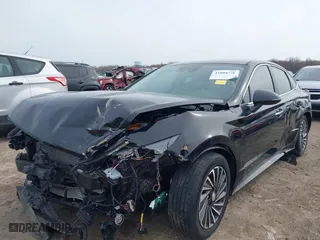 2022 Hyundai Sonata Hybrid SEL with VIN KMHL34JJ6NA050692, listed as a IAAI auction lot 42004770 with 62,514 mi miles. Bid and sale history available at carsss.com. Image 2.