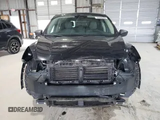 2020 Ford Escape S with VIN 1FMCU9F61LUB70605, listed as a Copart auction lot 58466065 with 70,348 mi miles and Salvage title. Bid and sale history available at DreamBid. Image 5.