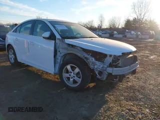 2014 Chevrolet Cruze 1LT z VIN 1G1PC5SB1E7401517, wystawiony jako IAAI lot #41390545 z przebiegiem 34 583 mil mil oraz . Historia ofert i sprzedaży dostępna na DreamBid. Obrazek 1.