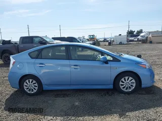 2012 Toyota Prius z VIN JTDKN3DP0C3017886, wystawiony jako IAAI lot #41966038 z przebiegiem 41 923 mil mil oraz . Historia ofert i sprzedaży dostępna na DreamBid. Obrazek 13.