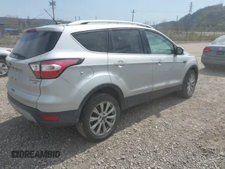 2017 Ford Escape Titanium with VIN 1FMCU9JD0HUE42509, listed as a IAAI auction lot 42079984 with 1 mi miles. Bid and sale history available at carsss.com. Image 4.