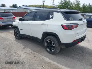 2017 Jeep Compass Trailhawk with VIN 3C4NJDDBXHT500588, listed as a IAAI auction lot 42060556 with 76,788 mi miles and . Bid and sale history available at DreamBid. Image 3.