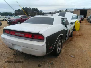2013 Dodge Challenger SXT z VIN 2C3CDYAG0DH648813, wystawiony jako IAAI lot #41480699 z przebiegiem 154 665 mil mil oraz . Historia ofert i sprzedaży dostępna na DreamBid. Obrazek 4.