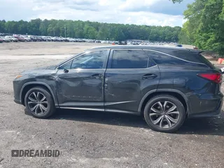 2018 Lexus RX 350L Premium z VIN JTJGZKCA2J2002663, wystawiony jako IAAI lot #42240476 z przebiegiem 159 429 mil mil oraz . Historia ofert i sprzedaży dostępna na DreamBid. Obrazek 14.