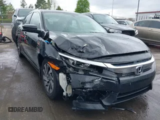 2016 Honda Civic EX with VIN 19XFC2F79GE023053, listed as a IAAI auction lot 41961571 with 136,054 mi miles and . Bid and sale history available at DreamBid. Image 6.