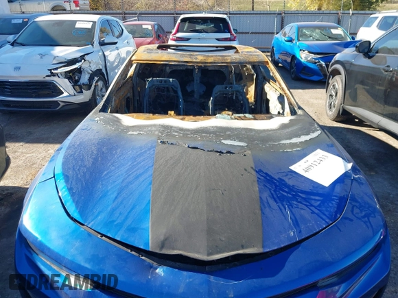 2017 Chevrolet Camaro 1LT z VIN 1G1FB1RX0H0146610, wystawiony jako IAAI lot #40912433 z przebiegiem Nie podano mil oraz . Historia ofert i sprzedaży dostępna na DreamBid. Obrazek 6.