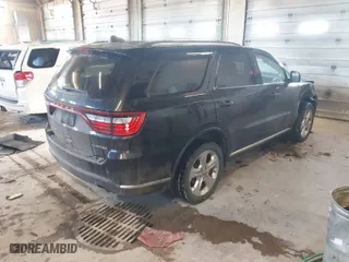 2014 Dodge Durango Limited with VIN 1C4RDJDG1EC973130, listed as a IAAI auction lot 41846596 with 166,182 mi miles. Bid and sale history available at carsss.com. Image 4.