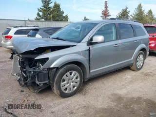2019 Dodge Journey SE with VIN 3C4PDCBB0KT719211, listed as a IAAI auction lot 41823499 with 151,569 mi miles and . Bid and sale history available at DreamBid. Image 20.