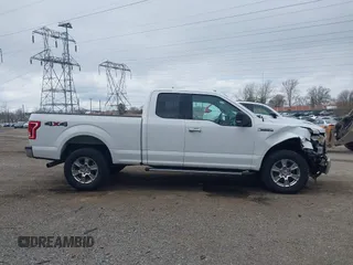 2015 Ford F-150 XLT with VIN 1FTFX1EFXFFC18381, listed as a IAAI auction lot 41886719 with 162,644 mi miles and . Bid and sale history available at DreamBid. Image 14.