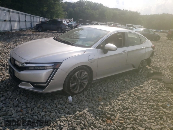 2018 Honda Clarity with VIN JHMZC5F14JC017054, listed as a Copart auction lot 65295514 with 74,498 mi miles and Salvage title. Bid and sale history available at DreamBid. Image 1.
