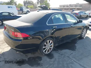 2006 Acura TSX Navi with VIN JH4CL969X6C014461, listed as a IAAI auction lot 42206844 with 119,201 mi miles and . Bid and sale history available at carsss.com. Image 4.