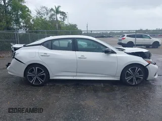 2023 Nissan Sentra SR with VIN 3N1AB8DV5PY272002, listed as a IAAI auction lot 42010828 with 13,210 mi miles and . Bid and sale history available at DreamBid. Image 14.