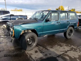 1996 Jeep Cherokee SE z VIN 1J4FJ28S6TL184205, wystawiony jako Copart lot #77558034 z przebiegiem 195 000 mil mil oraz Tytuł czysty. Historia ofert i sprzedaży dostępna na DreamBid. Obrazek 1.