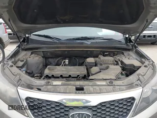 2012 Kia Sorento LX z VIN 5XYKT3A17CG295038, wystawiony jako IAAI lot #42294463 z przebiegiem 185 089 mil mil oraz . Historia ofert i sprzedaży dostępna na DreamBid. Obrazek 10.