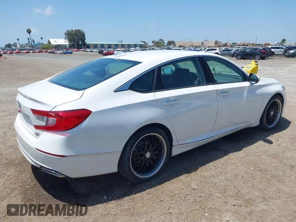 2021 Honda Accord Touring z VIN 1HGCV2F99MA007160, wystawiony jako IAAI lot #42164864 z przebiegiem 64 596 mil mil oraz . Historia ofert i sprzedaży dostępna na DreamBid. Obrazek 4.